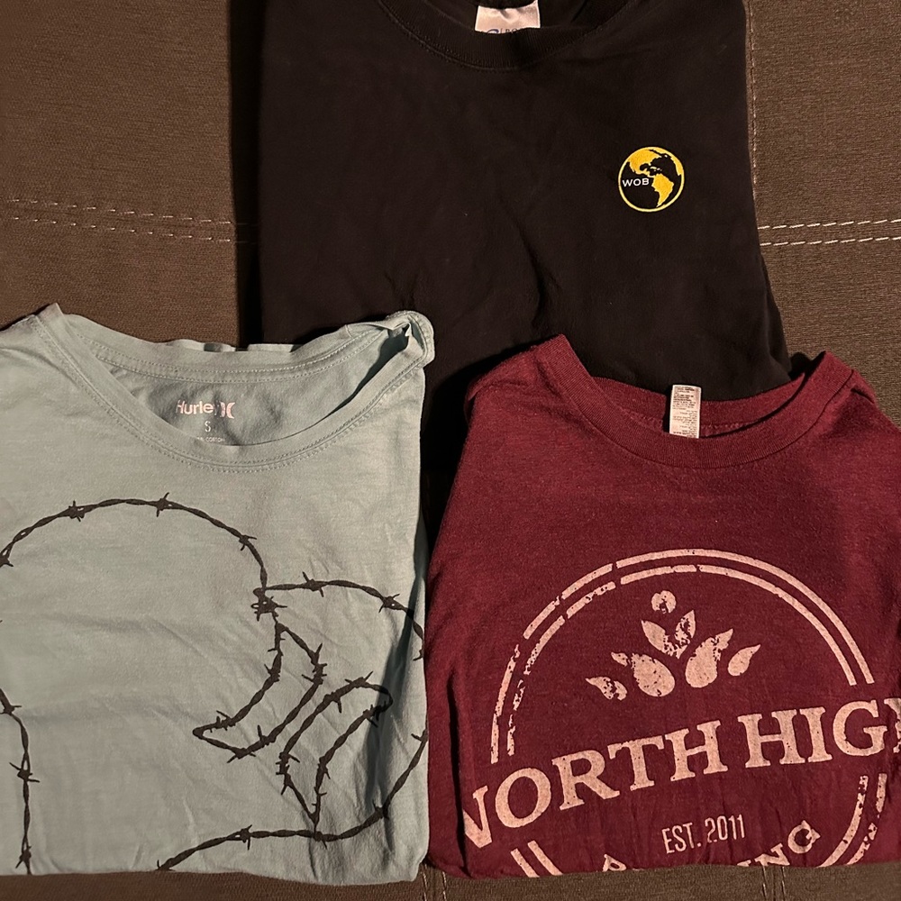 Three short sleeve shirts size small